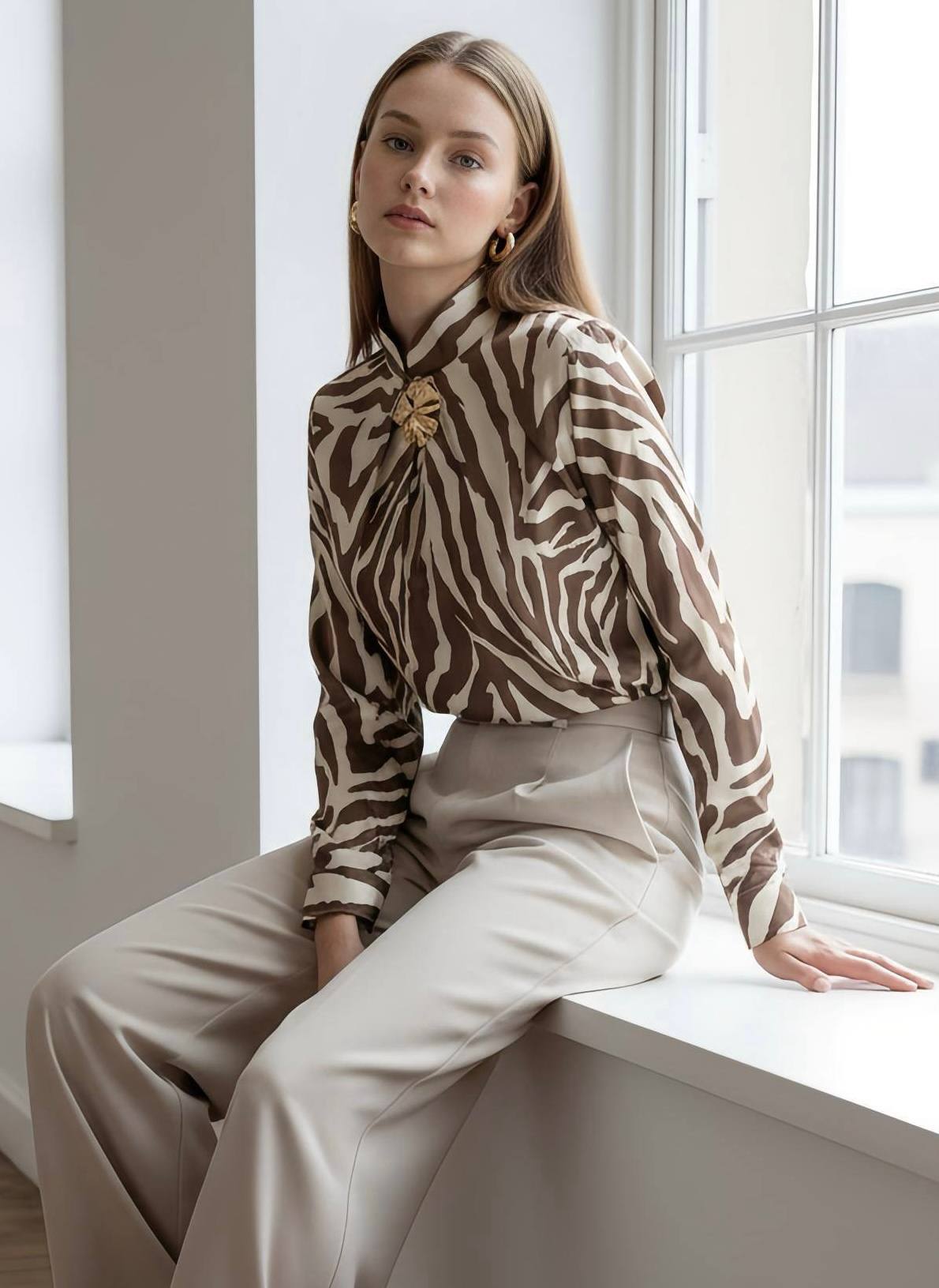 Zebra Print Satin Blouse with Gold Flower Brooch